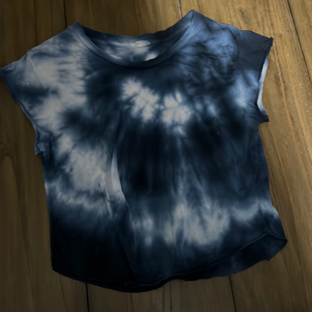 Crop top t also its very old I think idk I can’t see the tag it’s faded